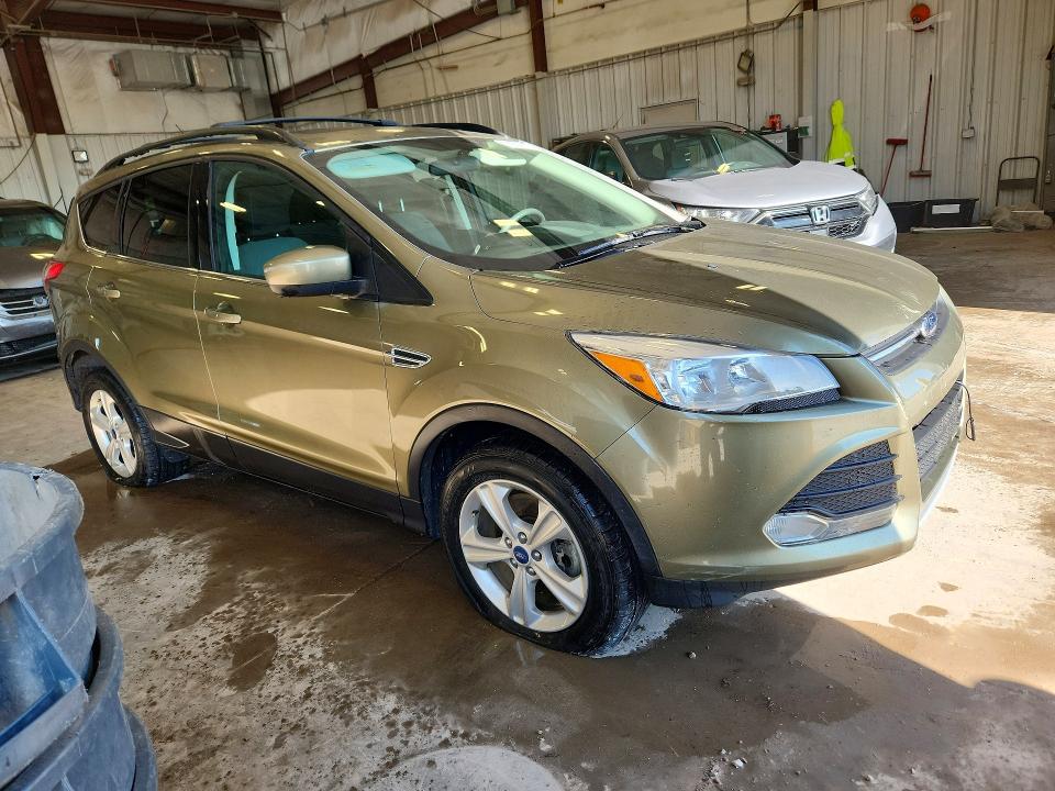 Photo 4 from auction – 2013 FORD ESCAPE with VIN 1FMCU9G99DUB70698