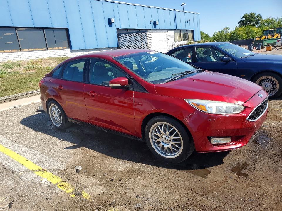 Photo 4 from auction – 2015 FORD FOCUS with VIN 1FADP3F29FL260739