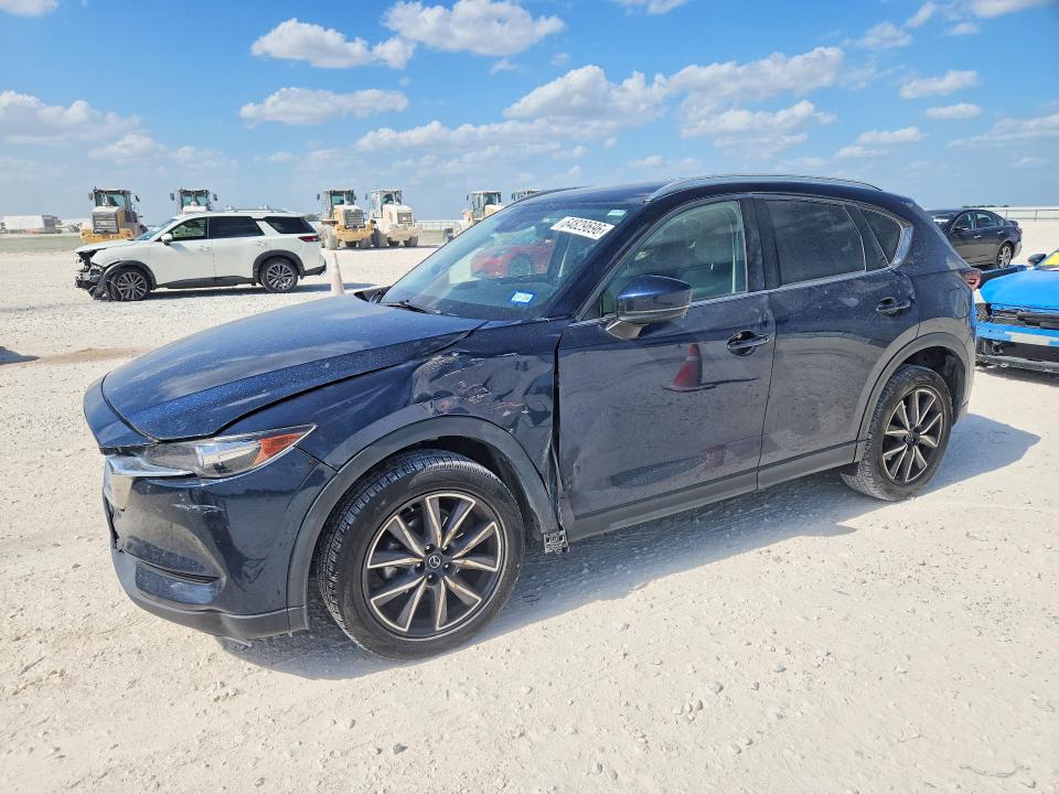 MAZDA CX-5 2018 with VIN JM3KFACM4J0400938 - Photo from auction