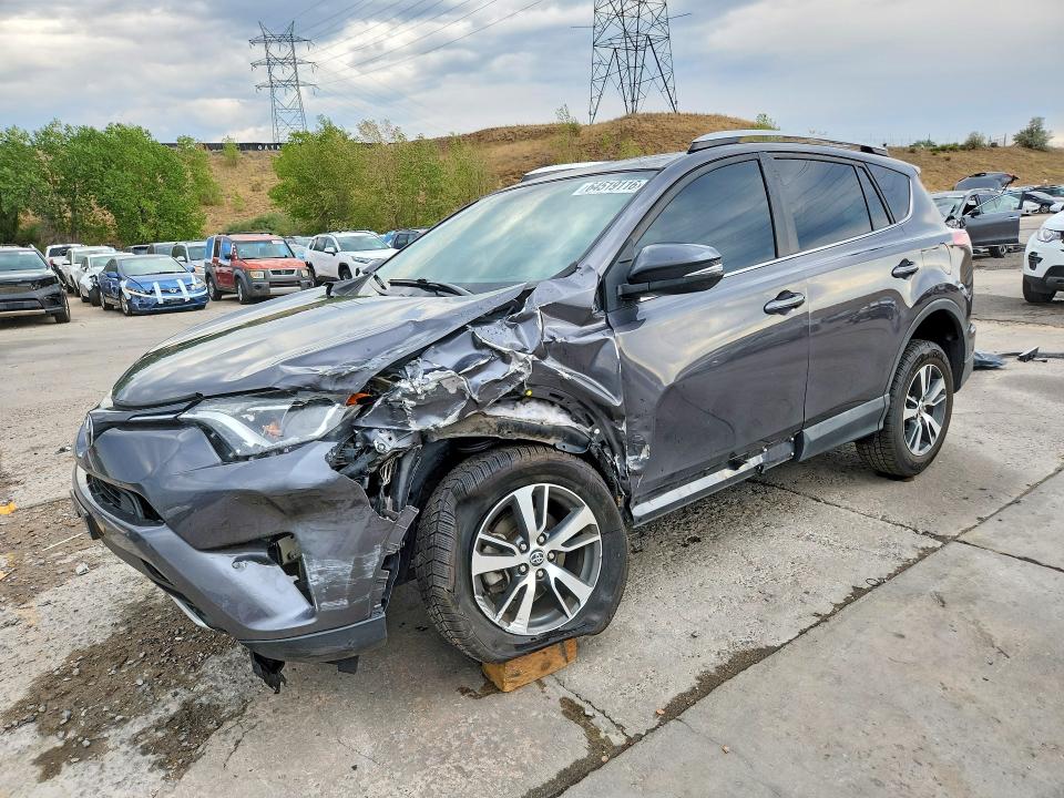 TOYOTA RAV4 2016 with VIN 2T3RFREV5GW465040 - Photo from auction