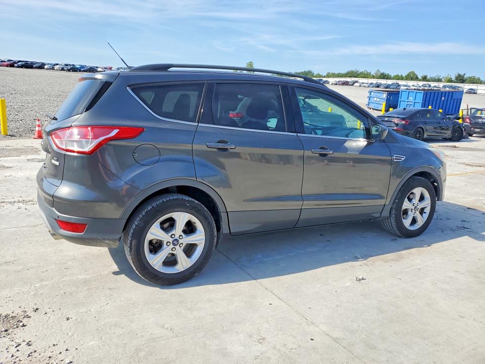 Photo 3 from auction – 2016 FORD ESCAPE with VIN 1FMCU0GX9GUC55720