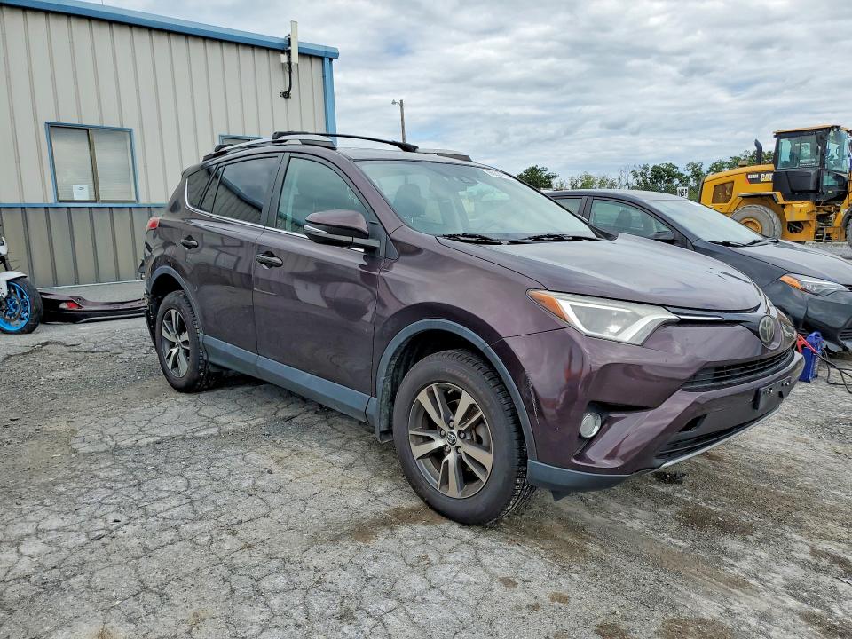 Photo 4 from auction – 2018 TOYOTA RAV4 with VIN 2T3RFREV9JW719954