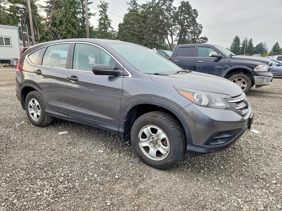 Photo 4 from auction – 2013 HONDA CR-V with VIN 2HKRM4H31DH611293