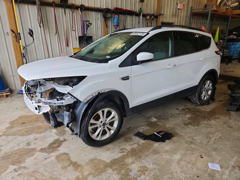 FORD ESCAPE 2018 with VIN 1FMCU0GD4JUA58709 - Photo from auction