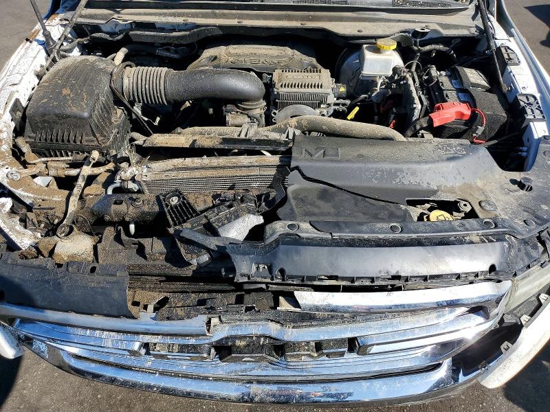 Photo 11 from auction – 2021 RAM 1500 with VIN 1C6RREJT1MN589918