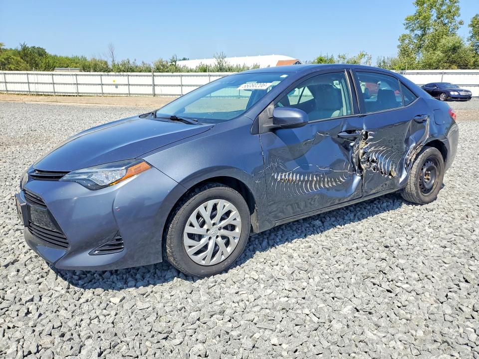 TOYOTA COROLLA 2017 with VIN 2T1BURHE3HC747742 - Photo from auction