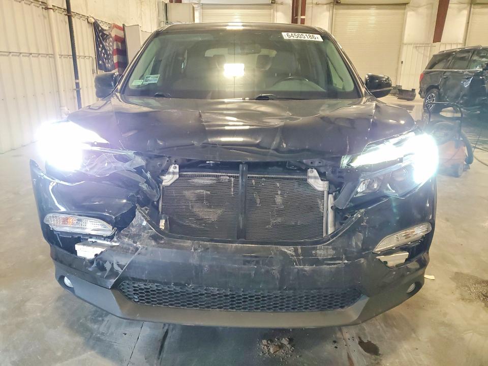 Photo 5 from auction – 2017 HONDA PILOT with VIN 5FNYF6H59HB104486