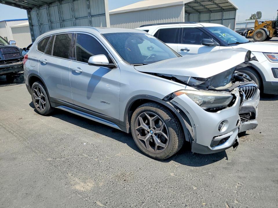 Photo 4 from auction – 2017 BMW X1 with VIN WBXHU7C34H5H34182
