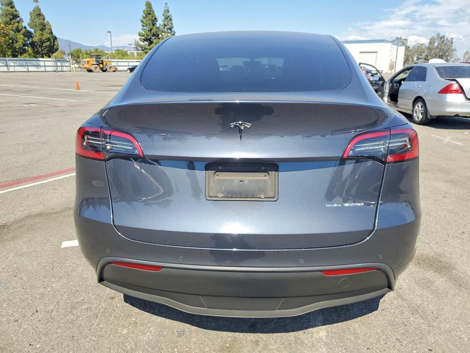 Photo 6 from auction – 2022 TESLA MODEL Y with VIN 7SAYGAEE6NF574137