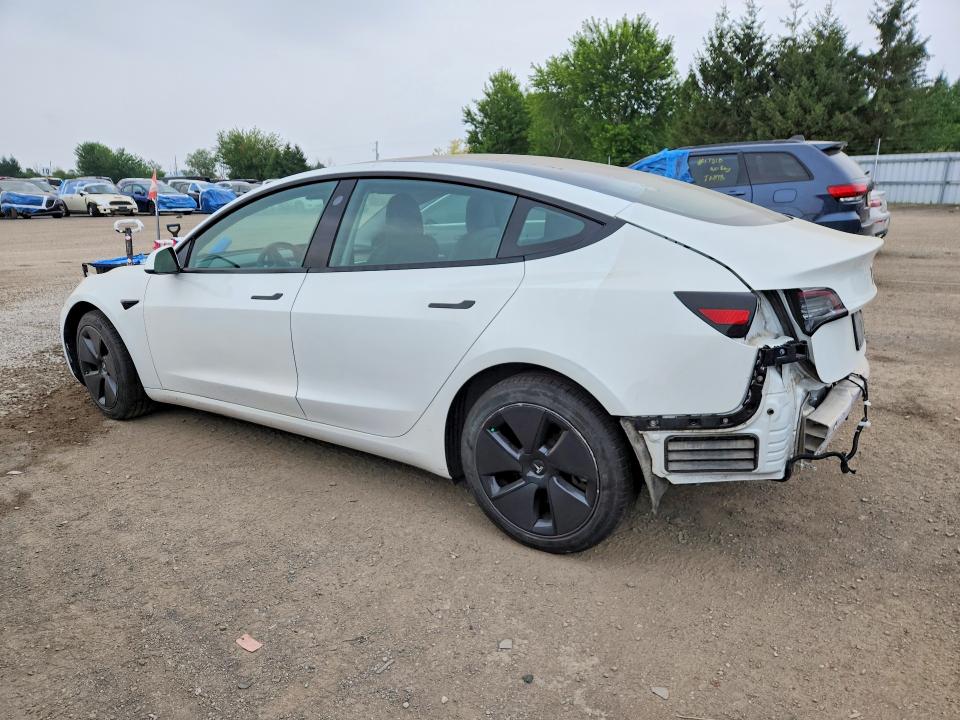 صورة رقم 2 من المزاد - 2021 TESLA MODEL 3 مع VIN 5YJ3E1EA6MF090722
