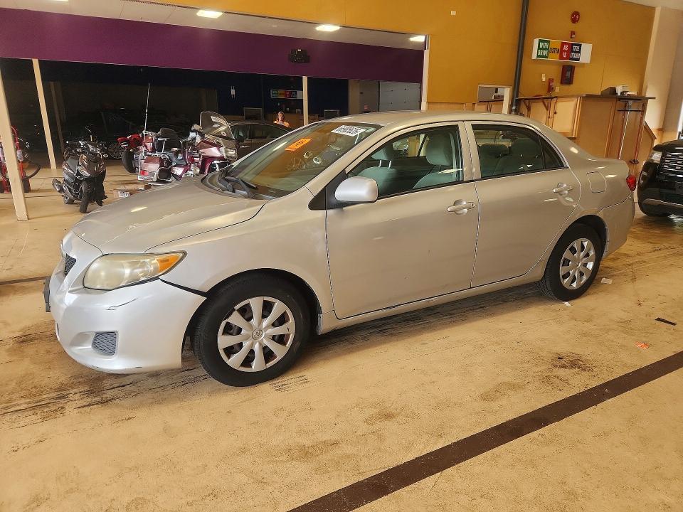 TOYOTA COROLLA 2010 with VIN 2T1BU4EE1AC244224 - Photo from auction