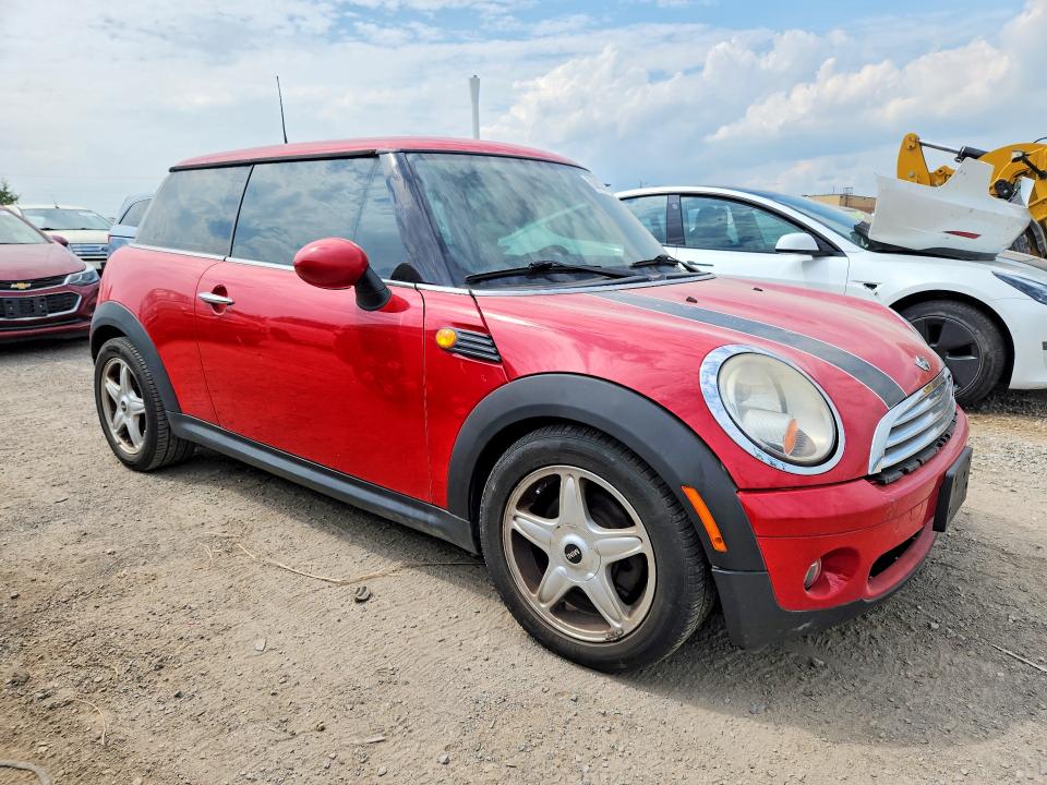 Photo 4 from auction – 2009 MINI COOPER with VIN WMWMF33599TZ21134