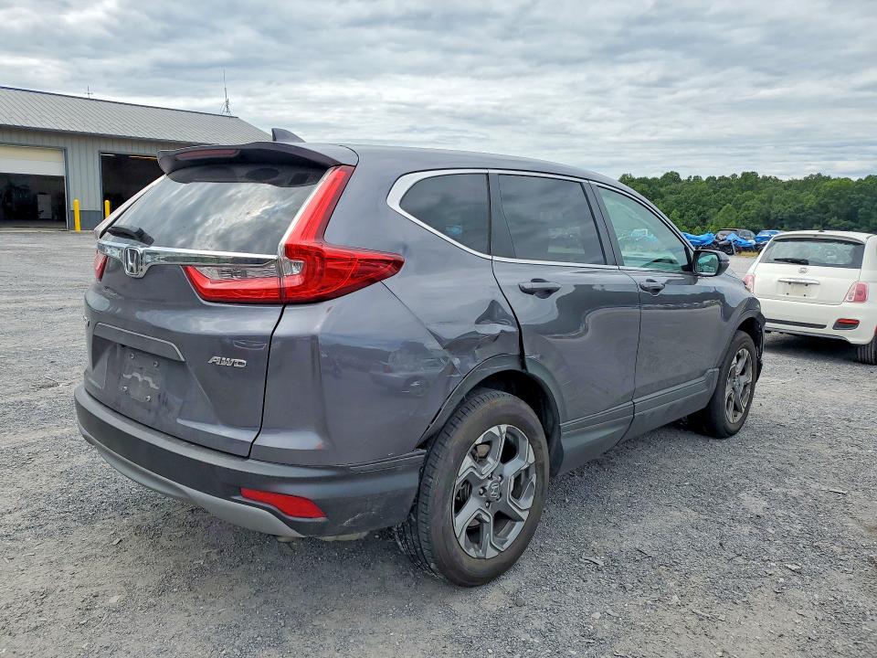 Photo 3 from auction – 2019 HONDA CR-V with VIN 5J6RW2H55KL031385