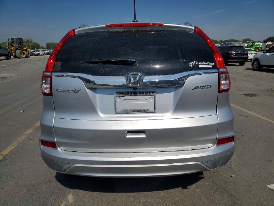 Photo 6 from auction – 2015 HONDA CR-V with VIN 2HKRM4H76FH617368