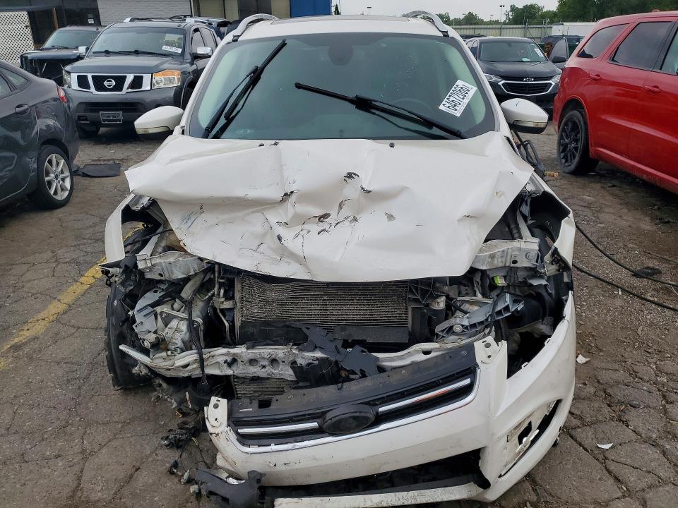 Photo 5 from auction – 2015 FORD ESCAPE with VIN 1FMCU9J96FUA41054
