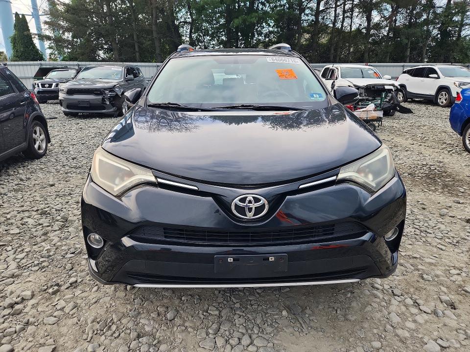Photo 5 from auction – 2016 TOYOTA RAV4 with VIN 2T3RFREV6GW429700
