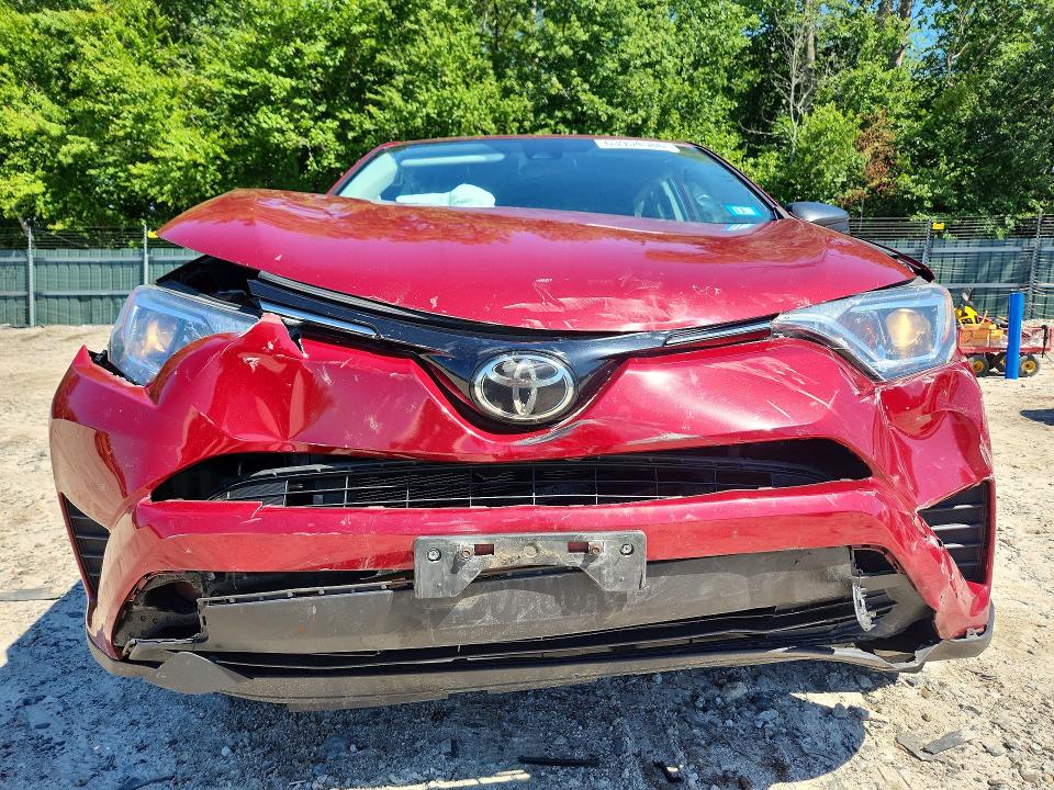 Photo 5 from auction – 2018 TOYOTA RAV4 with VIN 2T3BFREV2JW749914