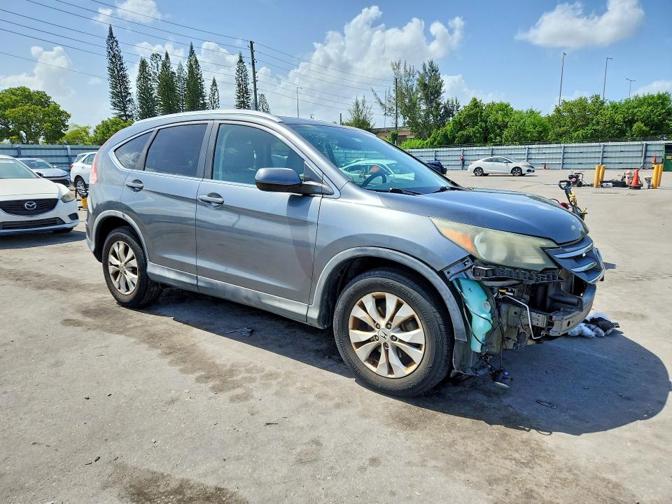 Photo 4 from auction – 2014 HONDA CR-V with VIN 5J6RM3H7XEL015572