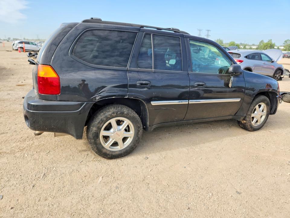 Photo 3 from auction – 2009 GMC ENVOY with VIN 1GKDT33S692113514