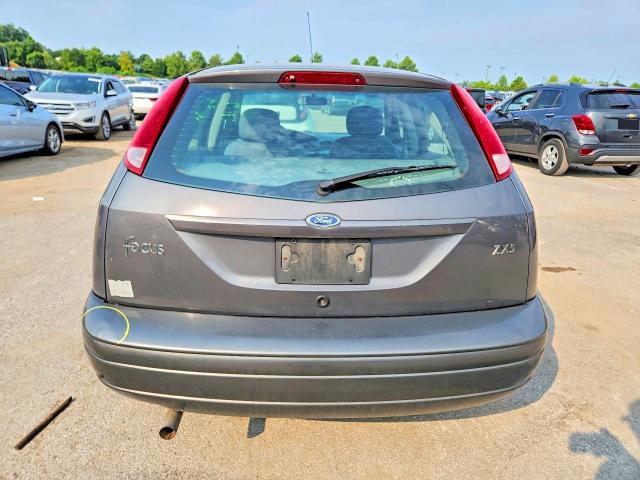 Photo 6 from auction – 2004 FORD FOCUS with VIN 3FAHP37344R106124