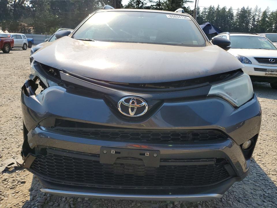 Photo 5 from auction – 2016 TOYOTA RAV4 with VIN JTMJFREV8GJ103246