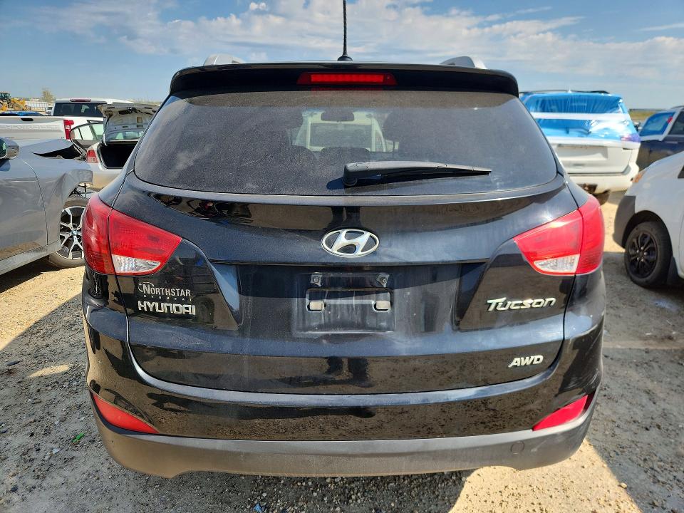 Photo 6 from auction – 2011 HYUNDAI TUCSON with VIN KM8JUCAC0BU178713