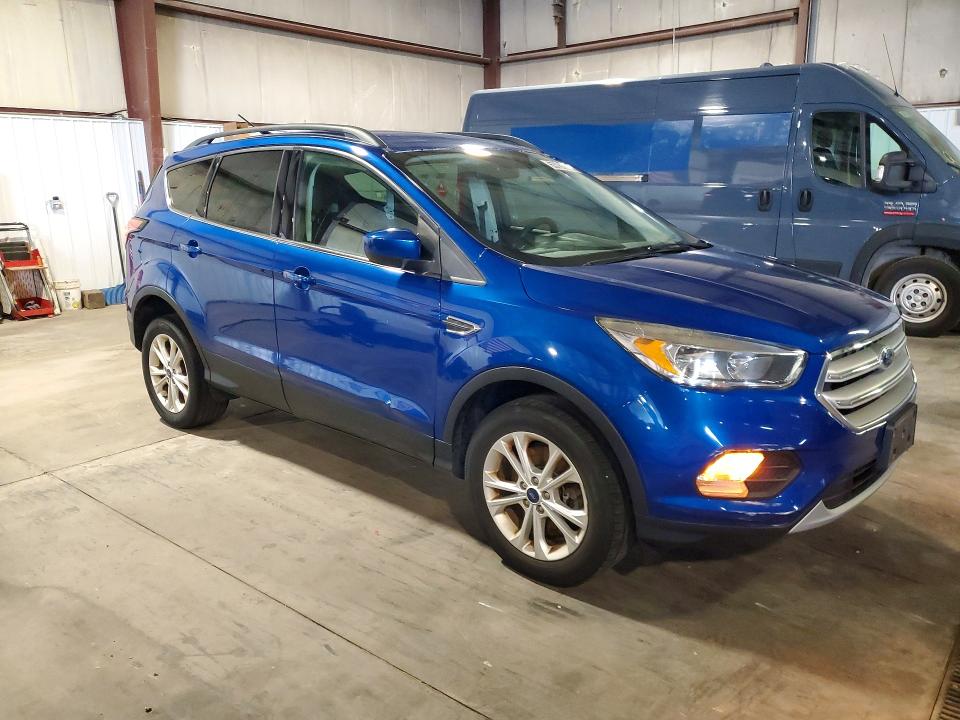 Photo 4 from auction – 2018 FORD ESCAPE with VIN 1FMCU9GD1JUA28409