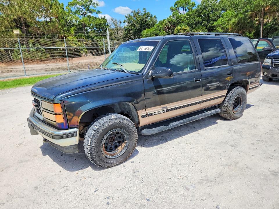 GMC YUKON 1998 with VIN 1GKEK13R2WJ719998 - Photo from auction