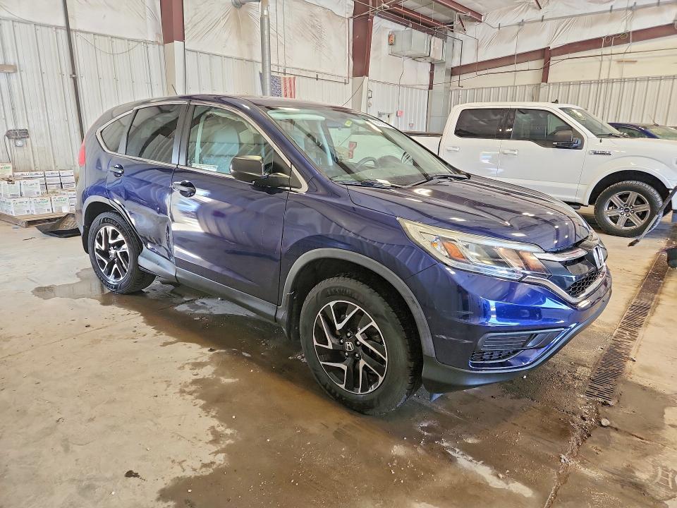 Photo 4 from auction – 2016 HONDA CR-V with VIN 5J6RM4H49GL055897