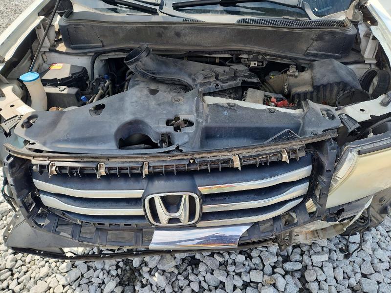 Photo 11 from auction – 2014 HONDA PILOT with VIN 5FNYF3H91EB025584