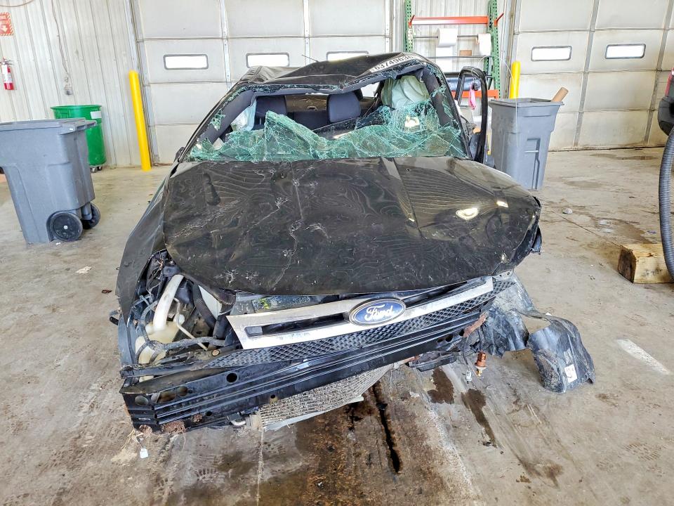 Photo 5 from auction – 2011 FORD FOCUS with VIN 1FAHP3FN6BW175720