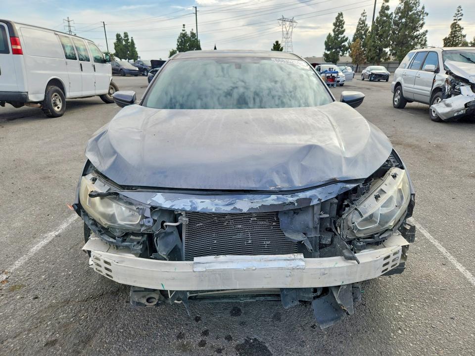 Photo 5 from auction – 2017 HONDA CIVIC with VIN 2HGFC2F50HH502063