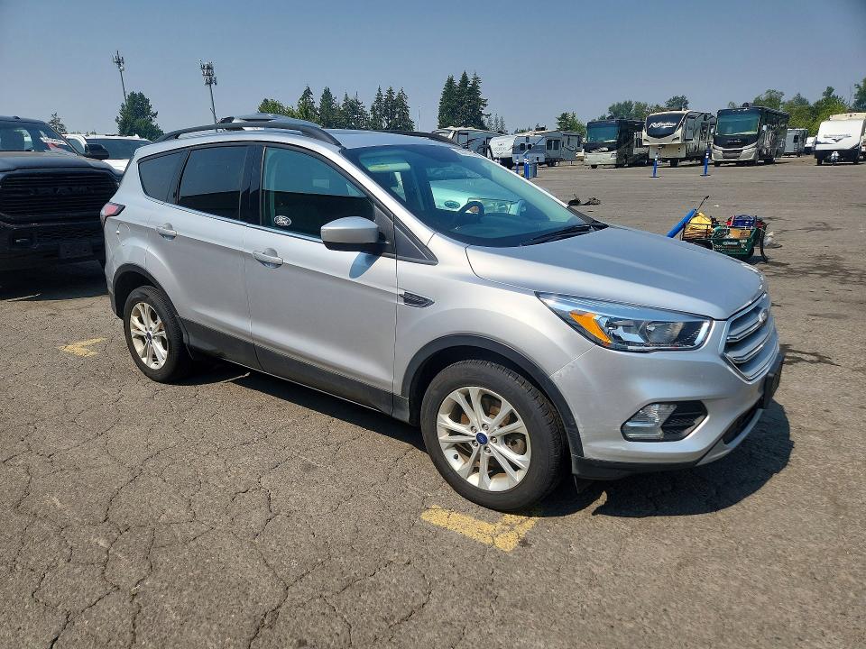 Photo 4 from auction – 2018 FORD ESCAPE with VIN 1FMCU9GD7JUC60948