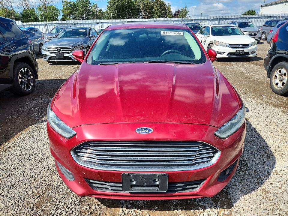 Photo 5 from auction – 2016 FORD FUSION with VIN 3FA6P0H79GR167867