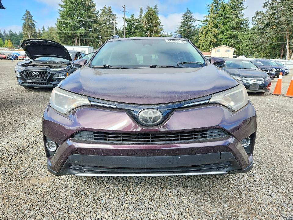 Фото 5 с аукциона – 2018 TOYOTA RAV4 с VIN 2T3RFREV1JW757789
