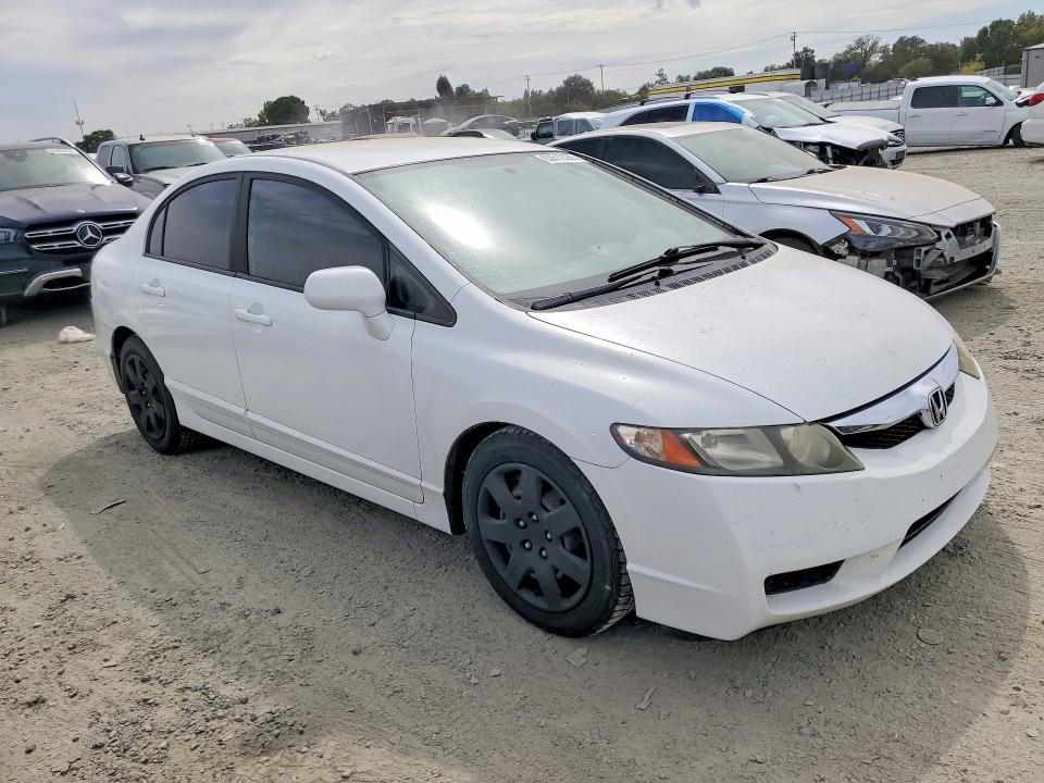 Photo 4 from auction – 2010 HONDA CIVIC with VIN 19XFA1F50AE070669