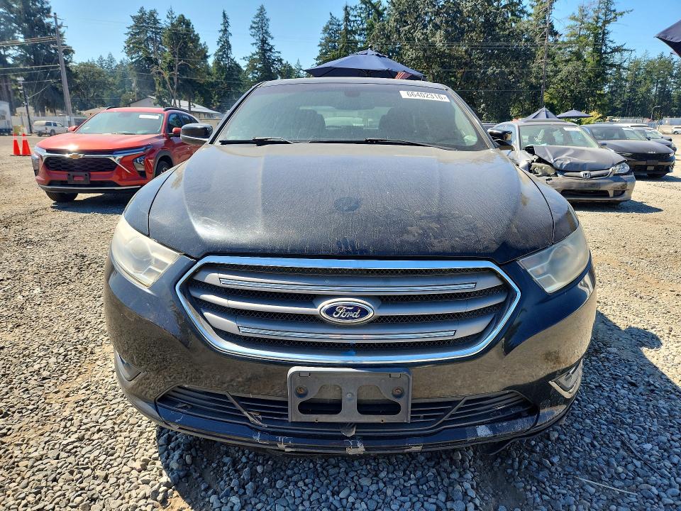 Foto 5 de la subasta – 2014 FORD TAURUS con VIN 1FAHP2H8XEG131929