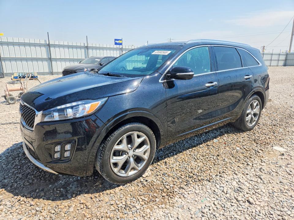 KIA SORENTO 2016 with VIN 5XYPK4A13GG006015 - Photo from auction