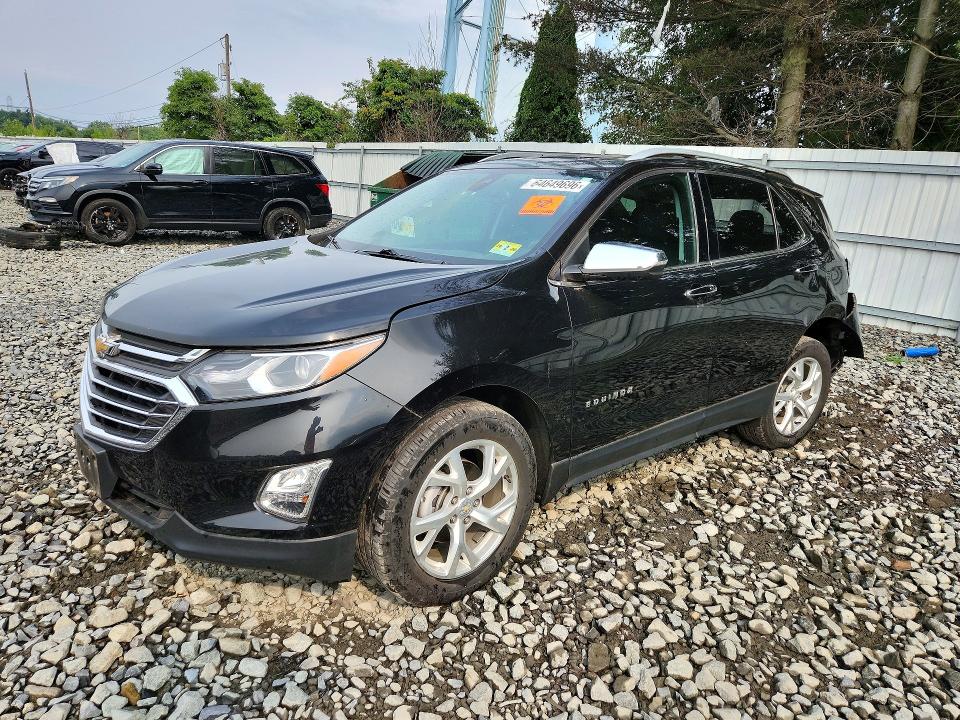 CHEVROLET EQUINOX 2021 with VIN 2GNAXXEV1M6148109 - Photo from auction