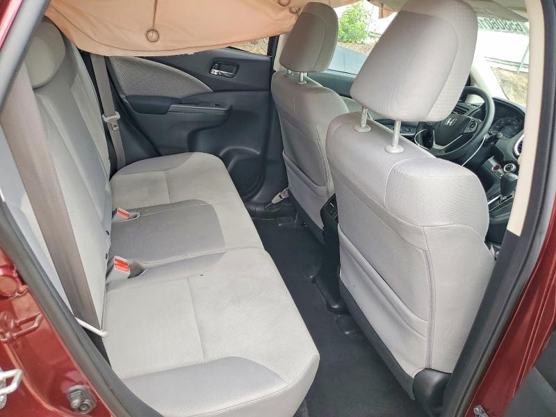 Photo 11 from auction – 2015 HONDA CR-V with VIN 2HKRM3H59FH542951
