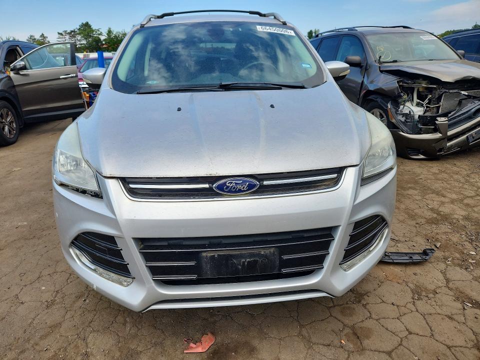 Photo 5 from auction – 2015 FORD ESCAPE with VIN 1FMCU9JX9FUA97360