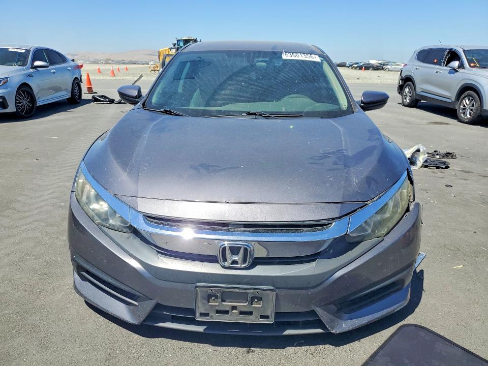 Photo 5 from auction – 2018 HONDA CIVIC with VIN 2HGFC2F57JH608855