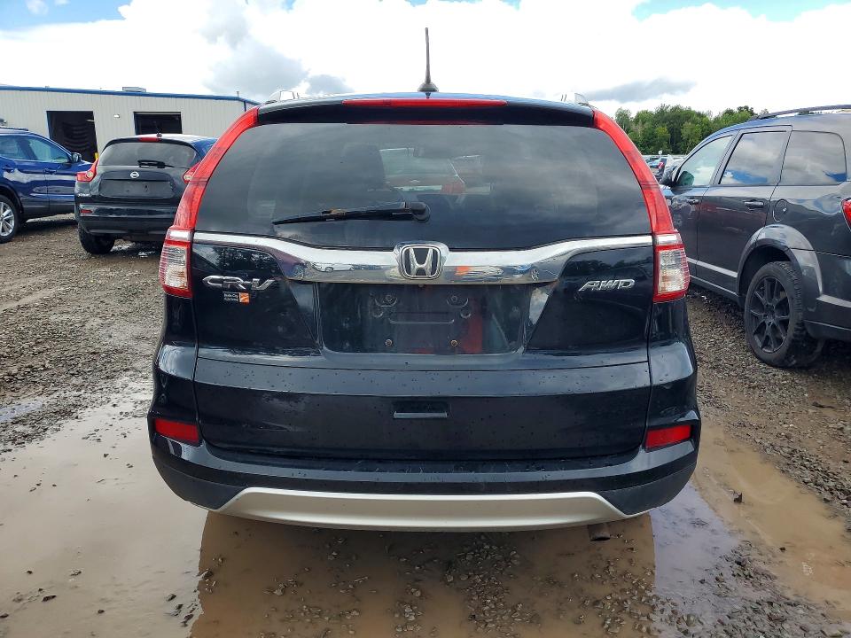 Photo 6 from auction – 2016 HONDA CR-V with VIN 5J6RM4H74GL031825