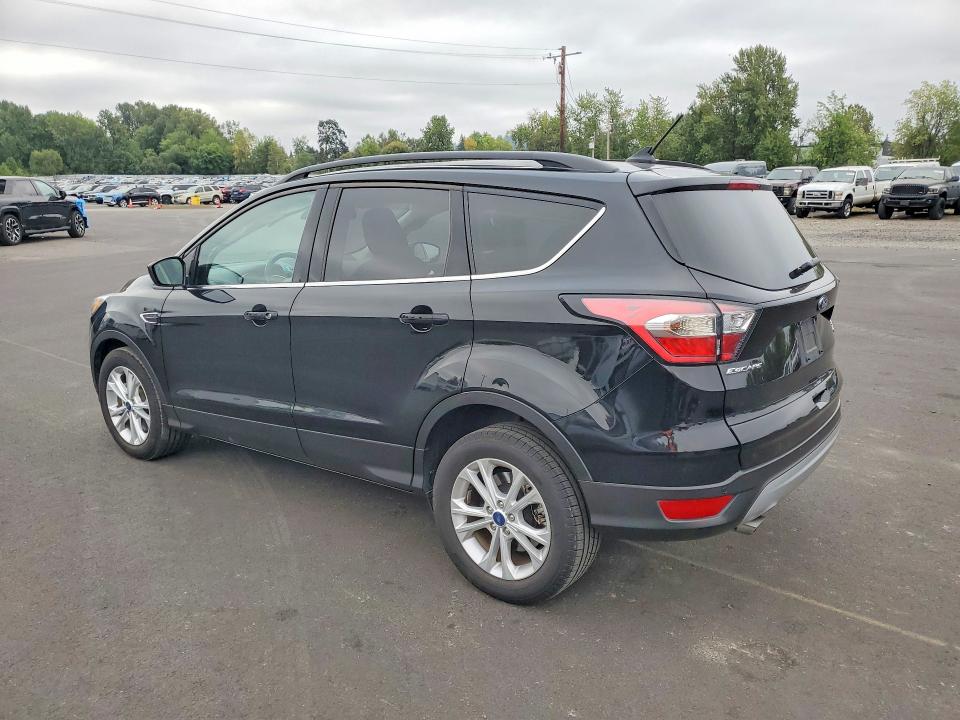 Photo 2 from auction – 2018 FORD ESCAPE with VIN 1FMCU9HD8JUA57436