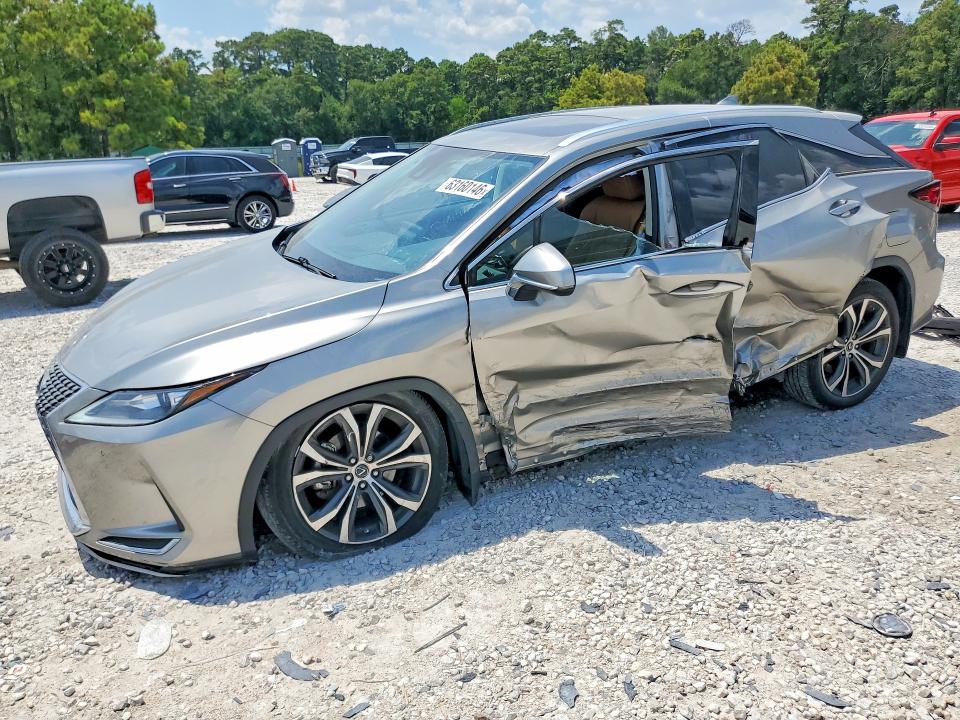 LEXUS RX 2021 with VIN 2T2HZMAAXMC202097 - Photo from auction