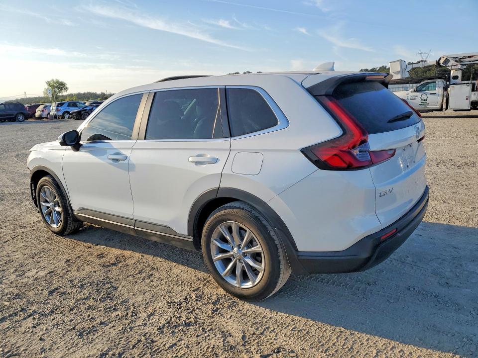 Photo 2 from auction – 2023 HONDA CR-V with VIN 2HKRS4H78PH409211