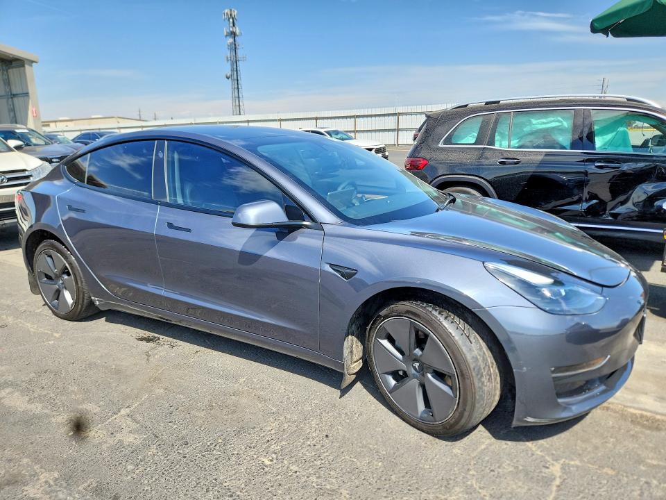 Photo 4 from auction – 2023 TESLA MODEL 3 with VIN 5YJ3E1EB8PF637387