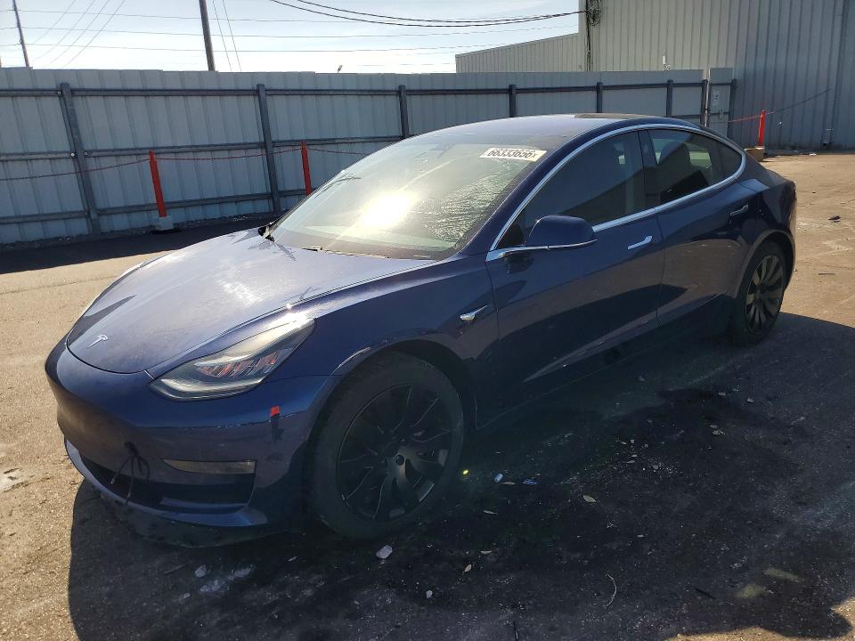 TESLA MODEL 3 2018 with VIN 5YJ3E1EB0JF090073 - Photo from auction