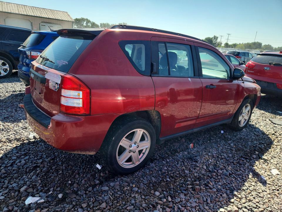 Photo 3 from auction – 2010 JEEP COMPASS with VIN 1J4NT4FB0AD505280