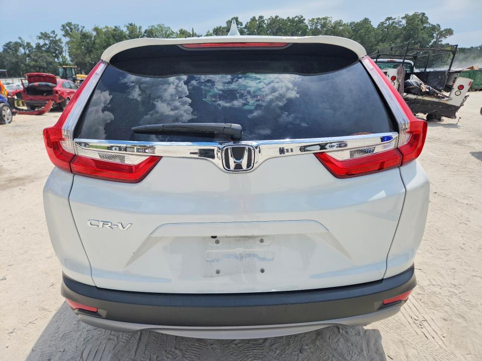 Photo 6 from auction – 2019 HONDA CR-V with VIN 7FARW1H84KE023277